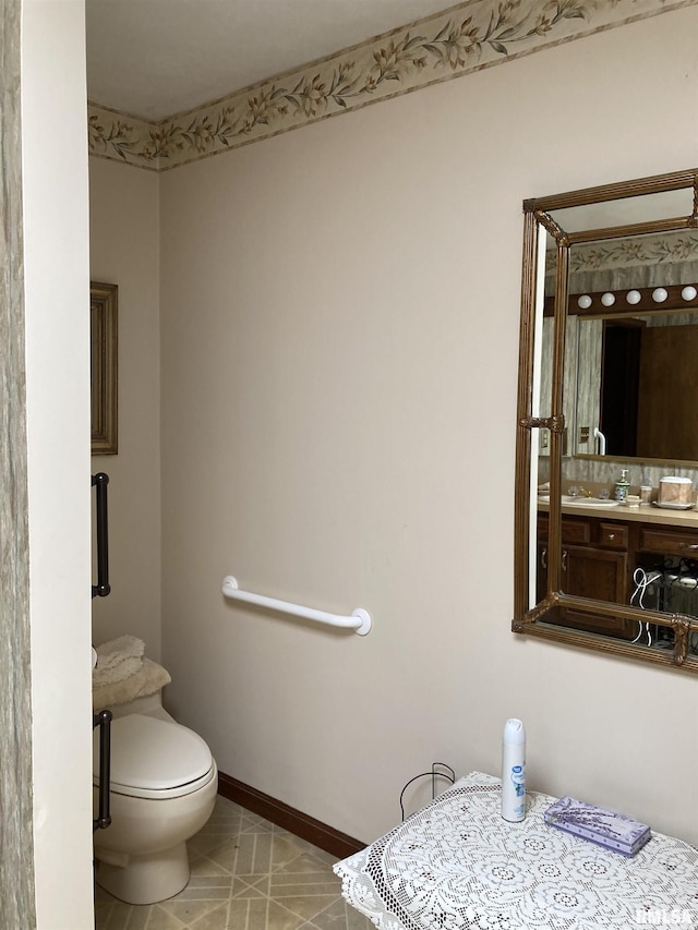 604 Knox Rd N Unit 1000, Gilson, IL 61436 - bathroom with toilet and baseboards
