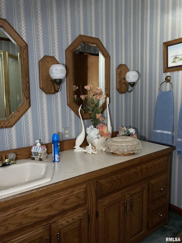 604 Knox Rd N Unit 1000, Gilson, IL 61436 - bathroom with double vanity and wallpapered walls