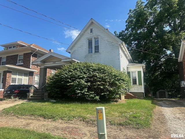 544 W Tompkins St, Galesburg, IL 61401 - view of front of home with a storage unit