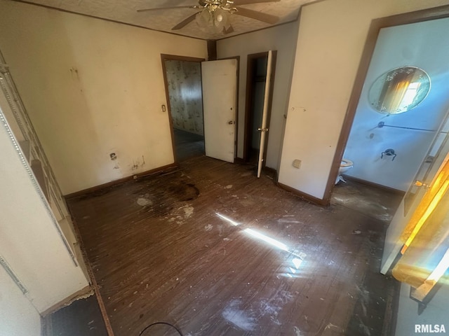 544 W Tompkins St, Galesburg, IL 61401 - unfurnished bedroom with wood finished floors and baseboards