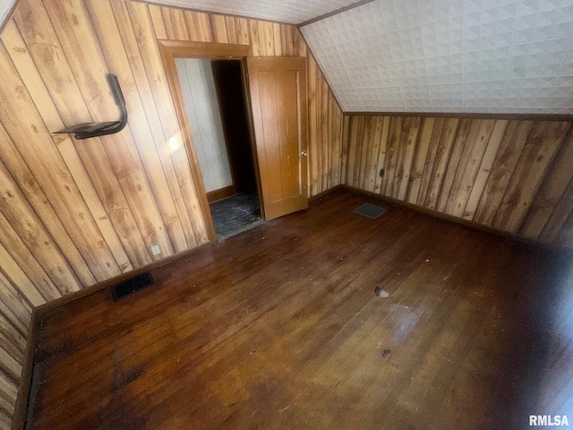 544 W Tompkins St, Galesburg, IL 61401 - bonus room with dark wood finished floors, lofted ceiling, and wooden walls