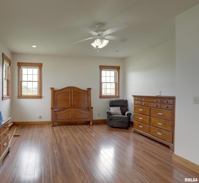 1784 N 2700th Ave, Loraine, IL 62349 - bedroom featuring multiple windows, wood finished floors, recessed lighting, and ceiling fan