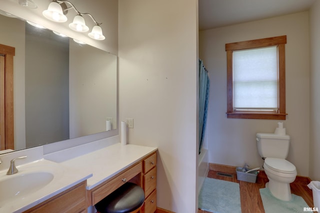 1784 N 2700th Ave, Loraine, IL 62349 - full bathroom featuring vanity, wood finished floors, and shower / bath combination with curtain