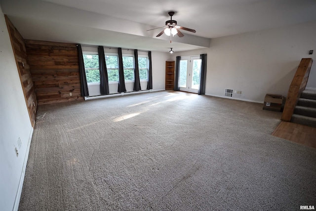 42060 County Highway 10, Nebo, IL 62355 - carpeted spare room with a ceiling fan and wooden walls