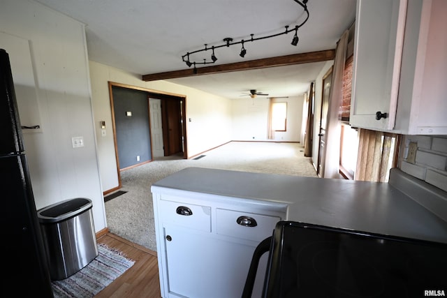 42060 County Highway 10, Nebo, IL 62355 - kitchen with range with electric stovetop, open floor plan, a ceiling fan, and white cabinets