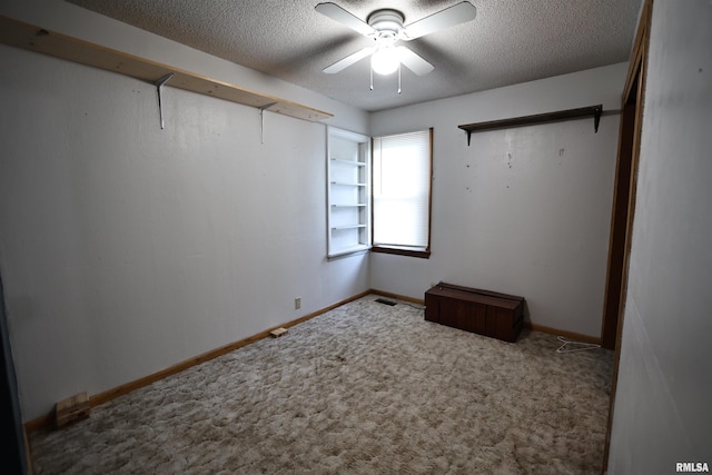 42060 County Highway 10, Nebo, IL 62355 - carpeted empty room featuring a textured ceiling and a ceiling fan