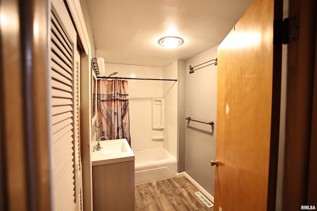 42060 County Highway 10, Nebo, IL 62355 - bathroom featuring wood finished floors, shower / tub combo with curtain, and vanity