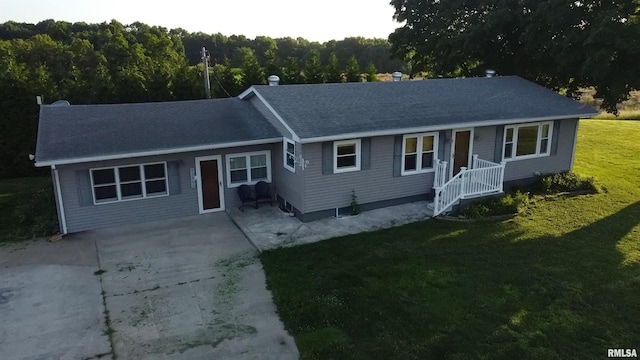 42060 County Highway 10, Nebo, IL 62355 - ranch-style home featuring a front lawn, concrete driveway, a view of trees, and roof with shingles