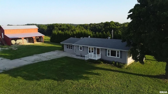 42060 County Highway 10, Nebo, IL 62355 - ranch-style house featuring a front yard, a wooded view, and driveway