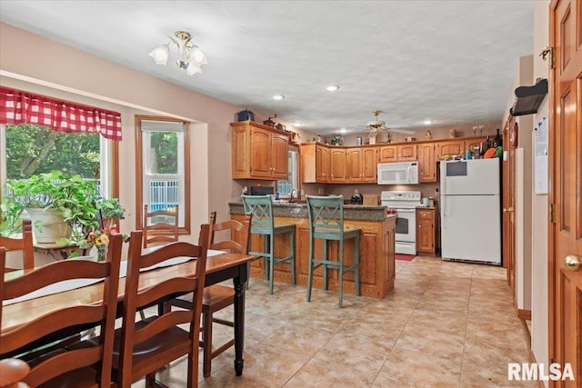 1420 Weston Pointe Dr, Springfield, IL 62704 - dining space featuring a ceiling fan and recessed lighting