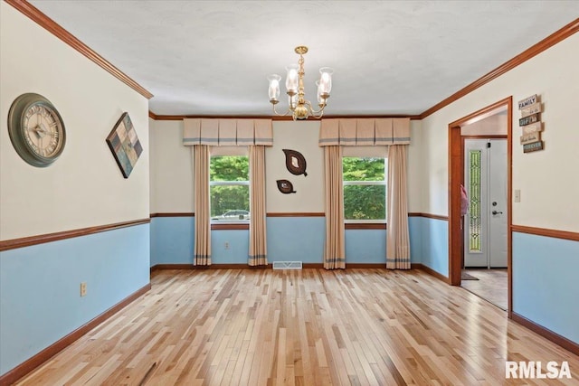 1420 Weston Pointe Dr, Springfield, IL 62704 - unfurnished room with crown molding, hardwood / wood-style flooring, and a chandelier