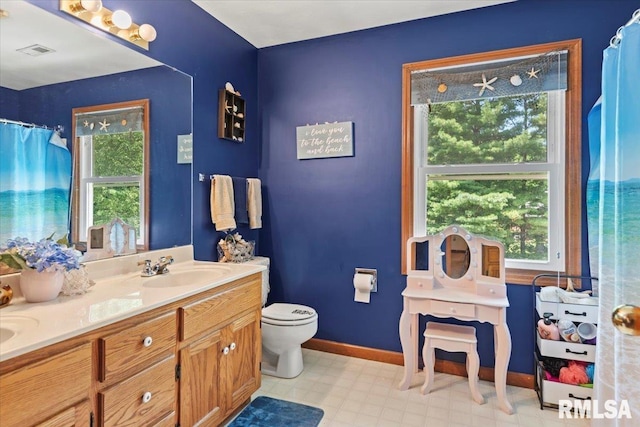 1420 Weston Pointe Dr, Springfield, IL 62704 - bathroom featuring healthy amount of natural light, double vanity, and tile patterned floors