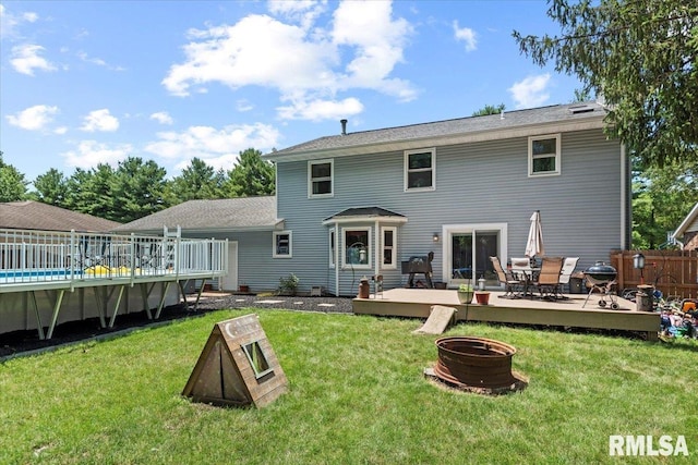 1420 Weston Pointe Dr, Springfield, IL 62704 - back of house with a fire pit, a deck, and outdoor dining area