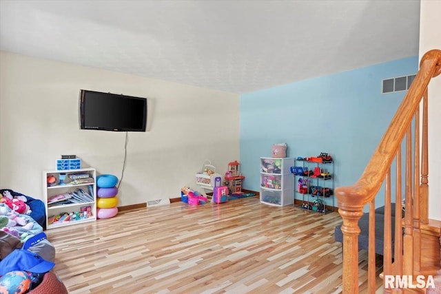 1420 Weston Pointe Dr, Springfield, IL 62704 - rec room with wood finished floors and baseboards