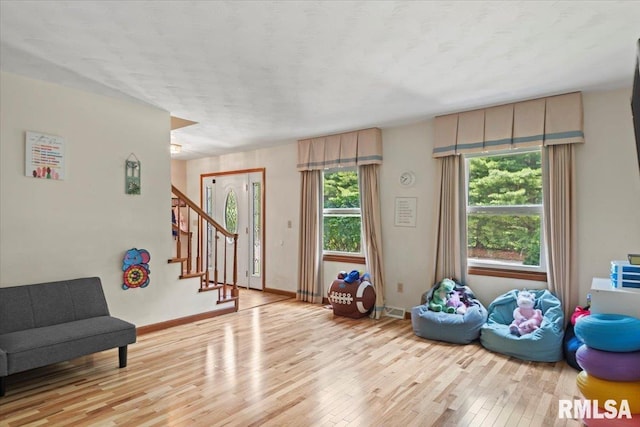1420 Weston Pointe Dr, Springfield, IL 62704 - playroom with light wood-type flooring and baseboards