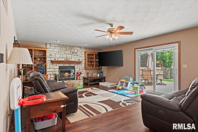1420 Weston Pointe Dr, Springfield, IL 62704 - living area with wood finished floors, ceiling fan, a fireplace, and built in features