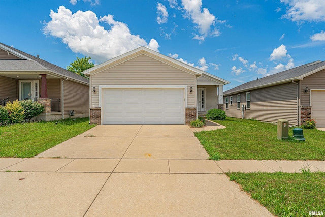 3 Megan Ct, Bloomington, IL 61705 - view of front of property with brick siding, a front lawn, and driveway