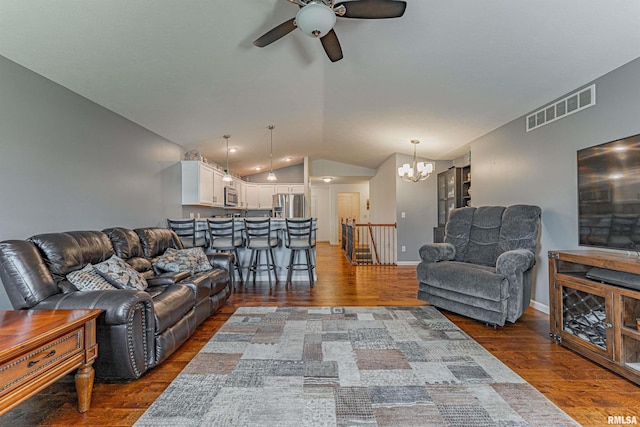 3 Megan Ct, Bloomington, IL 61705 - living room with ceiling fan, vaulted ceiling, wood finished floors, and a chandelier