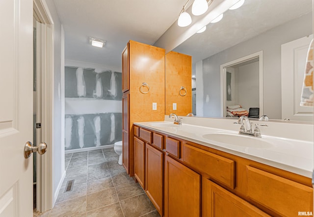 3 Megan Ct, Bloomington, IL 61705 - full bath with double vanity and toilet
