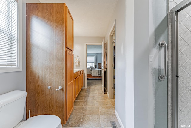3 Megan Ct, Bloomington, IL 61705 - ensuite bathroom with a shower stall and toilet