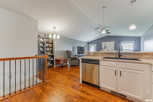 3 Megan Ct, Bloomington, IL 61705 - kitchen featuring stainless steel dishwasher, hardwood / wood-style floors, lofted ceiling, a ceiling fan, and decorative light fixtures