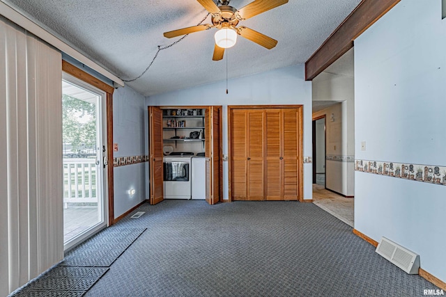 913 N Flora Dr, Mount Pulaski, IL 62548 - unfurnished room with separate washer and dryer, a textured ceiling, vaulted ceiling, carpet, and a ceiling fan