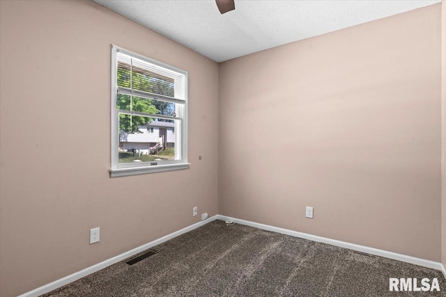 913 Diane Ct, Springfield, IL 62702 - empty room featuring dark colored carpet, a ceiling fan, and a textured ceiling