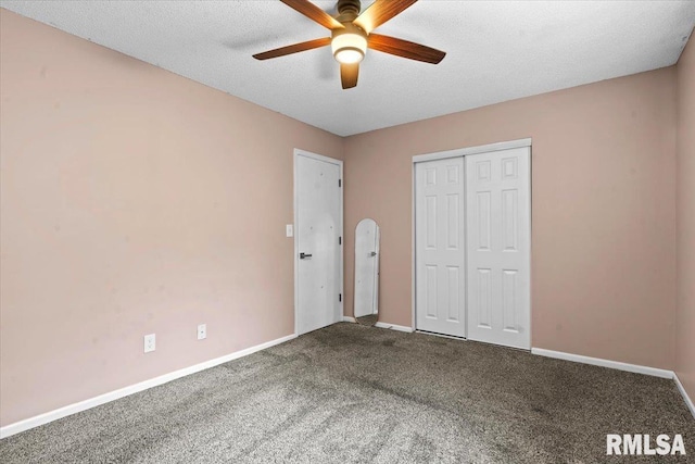913 Diane Ct, Springfield, IL 62702 - unfurnished bedroom featuring carpet flooring, a closet, ceiling fan, and a textured ceiling
