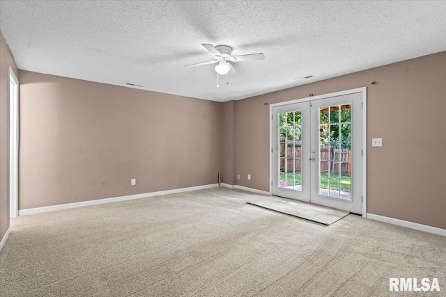 913 Diane Ct, Springfield, IL 62702 - unfurnished room featuring french doors, carpet floors, a ceiling fan, and a textured ceiling