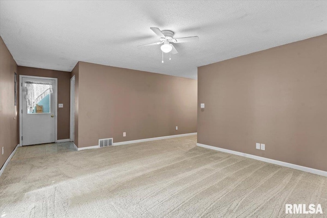 913 Diane Ct, Springfield, IL 62702 - empty room with a ceiling fan, light colored carpet, and a textured ceiling