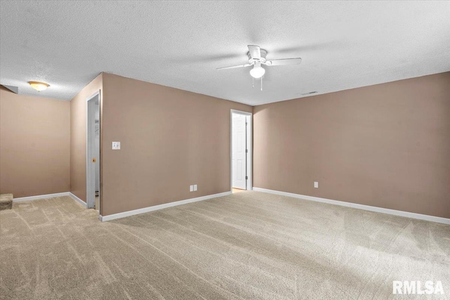 913 Diane Ct, Springfield, IL 62702 - spare room with ceiling fan, a textured ceiling, and light colored carpet