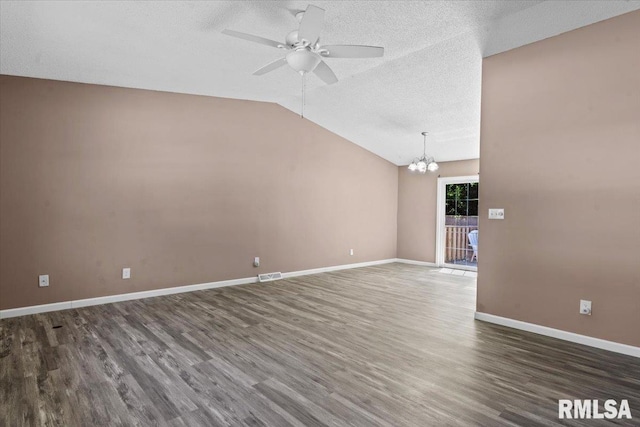 913 Diane Ct, Springfield, IL 62702 - unfurnished room featuring a chandelier, wood finished floors, ceiling fan, vaulted ceiling, and a textured ceiling