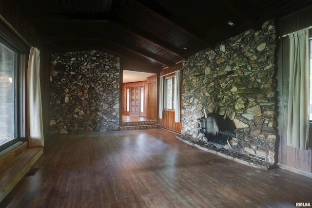 1220 Springdale S Dr, Quincy, IL 62305 - unfurnished living room featuring hardwood / wood-style floors, wood ceiling, and a stone fireplace
