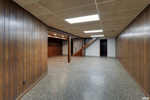 1220 Springdale S Dr, Quincy, IL 62305 - finished below grade area with wooden walls, stairs, and a paneled ceiling
