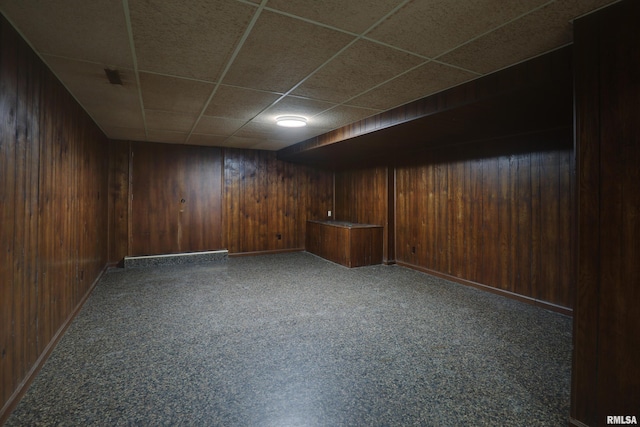 1220 Springdale S Dr, Quincy, IL 62305 - unfurnished room featuring a drop ceiling and wood walls