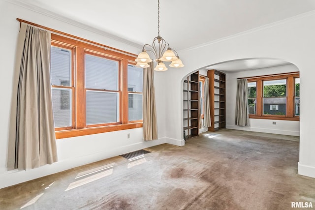 417 E Keys Ave, Springfield, IL 62702 - carpeted spare room with arched walkways, ornamental molding, a chandelier, and built in features