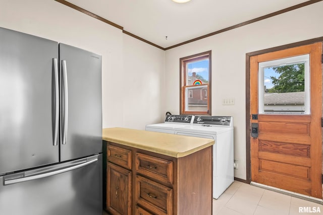417 E Keys Ave, Springfield, IL 62702 - laundry room featuring ornamental molding, plenty of natural light, and washer and dryer