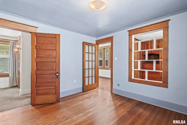 417 E Keys Ave, Springfield, IL 62702 - spare room featuring baseboards and wood finished floors