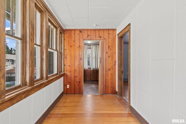 417 E Keys Ave, Springfield, IL 62702 - corridor with light wood-type flooring and wooden walls
