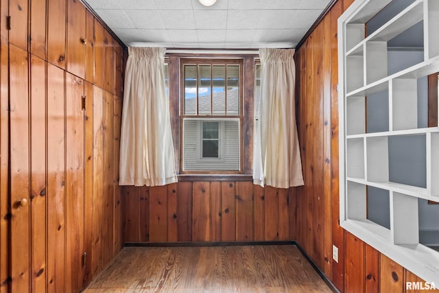 417 E Keys Ave, Springfield, IL 62702 - unfurnished room featuring wood walls and wood finished floors