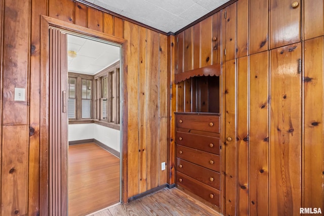 417 E Keys Ave, Springfield, IL 62702 - hallway featuring light wood-style flooring and wood walls