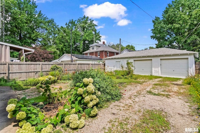 417 E Keys Ave, Springfield, IL 62702 - view of yard featuring a garage, an outbuilding, and driveway