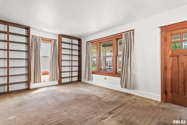 417 E Keys Ave, Springfield, IL 62702 - carpeted spare room with crown molding and baseboards