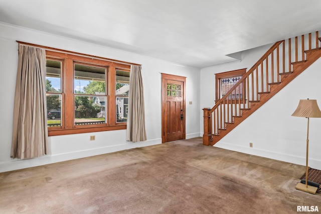 417 E Keys Ave, Springfield, IL 62702 - carpeted entrance foyer featuring stairs and crown molding