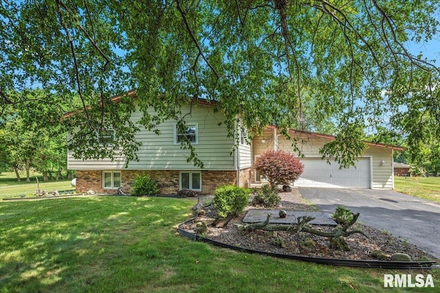5016 Kinsinger Ln, Pleasant Plains, IL 62677 - view of front of property with asphalt driveway, a front yard, and a garage