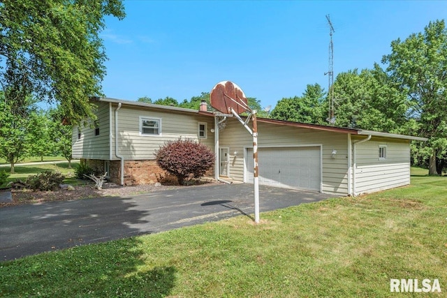5016 Kinsinger Ln, Pleasant Plains, IL 62677 - view of front of house featuring driveway, an attached garage, and a front lawn