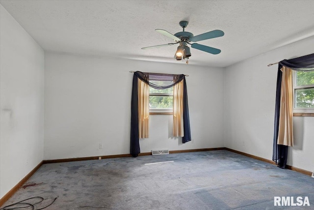 5016 Kinsinger Ln, Pleasant Plains, IL 62677 - spare room featuring carpet, a textured ceiling, and ceiling fan