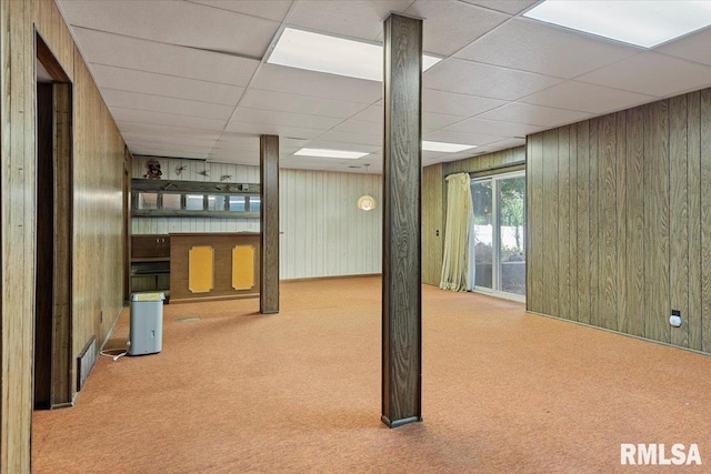 5016 Kinsinger Ln, Pleasant Plains, IL 62677 - below grade area featuring carpet, wooden walls, and a paneled ceiling