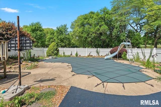 5016 Kinsinger Ln, Pleasant Plains, IL 62677 - view of swimming pool with a water slide and a patio area