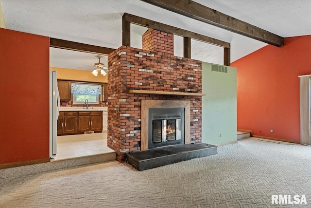 5016 Kinsinger Ln, Pleasant Plains, IL 62677 - unfurnished living room featuring light colored carpet, ceiling fan, a fireplace, and a textured ceiling